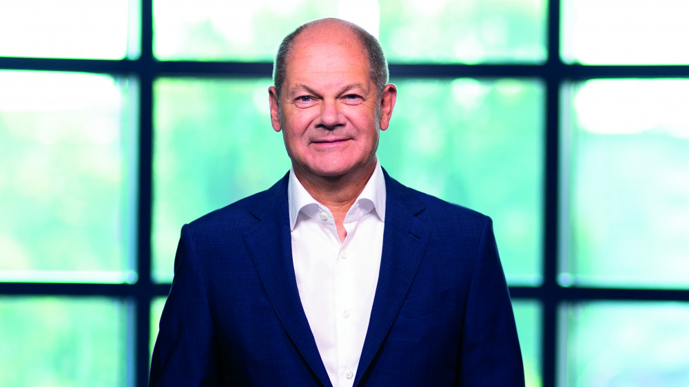Versicherungsbote stellt vor, was die SPD (hier Spitzenkandidat Olaf Scholz) für die Sozial- und Steuerpolitik plant .
